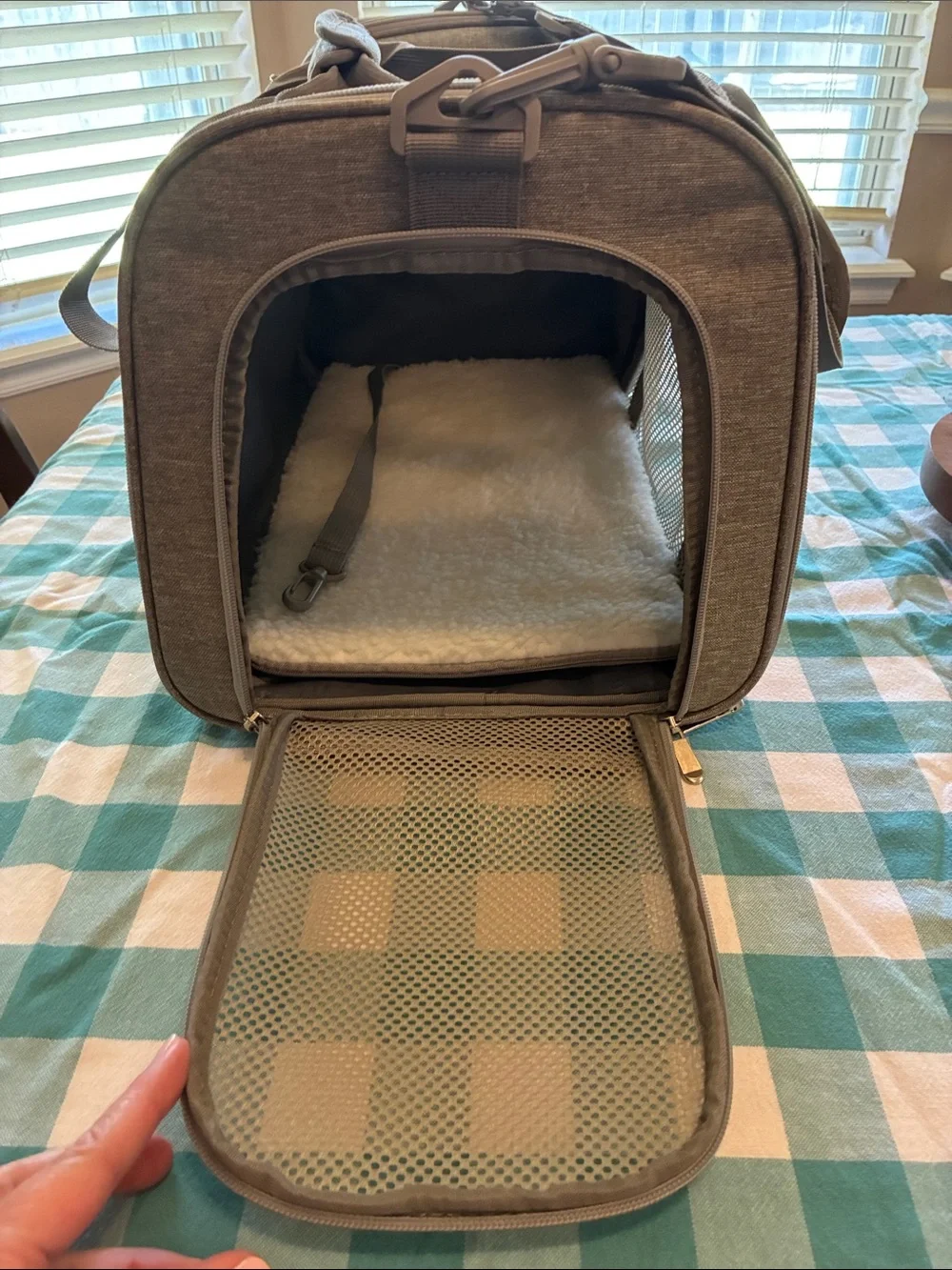 Gray cloth travel carrier for small dog
